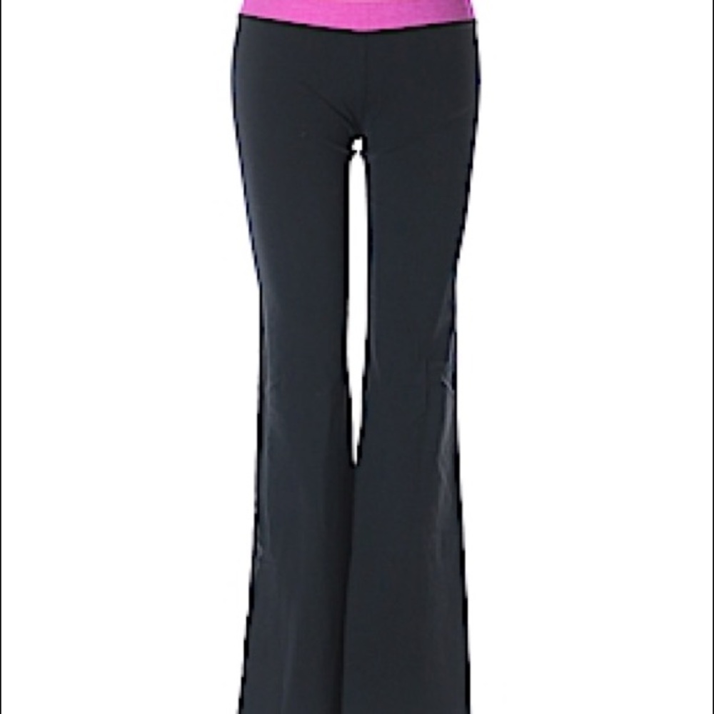 Lululemon black yoga pants with yellow waist line